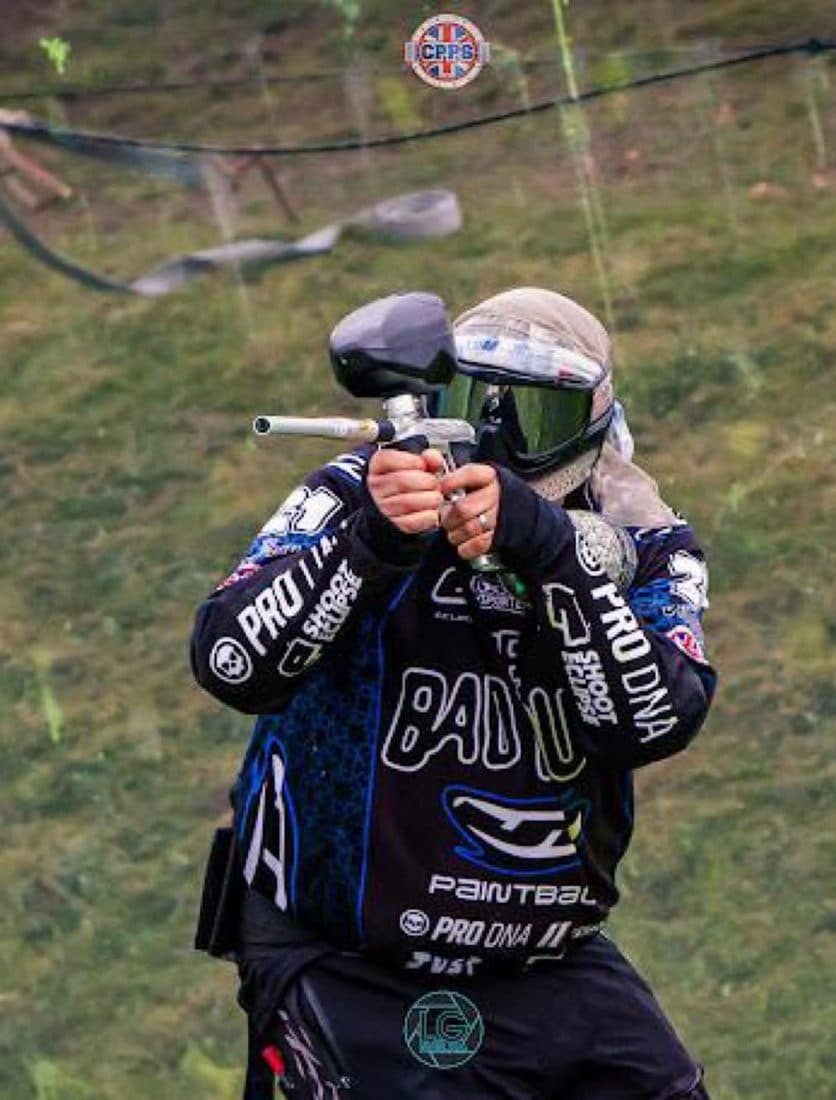 Bad Touch player shooting from behind a bunker at a CPPS event